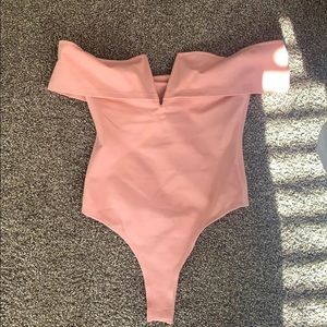 Over the shoulder body suit